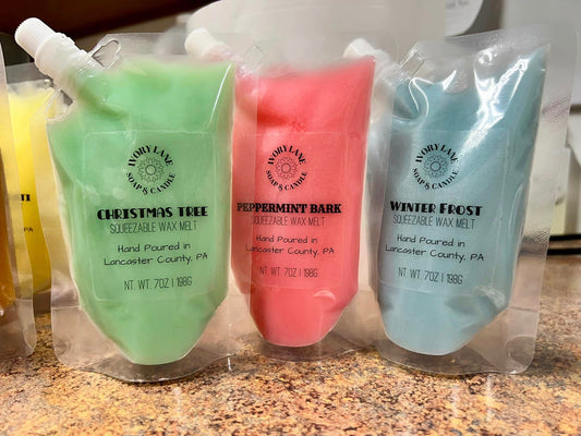 Green Red and Blue wax melts on countertop